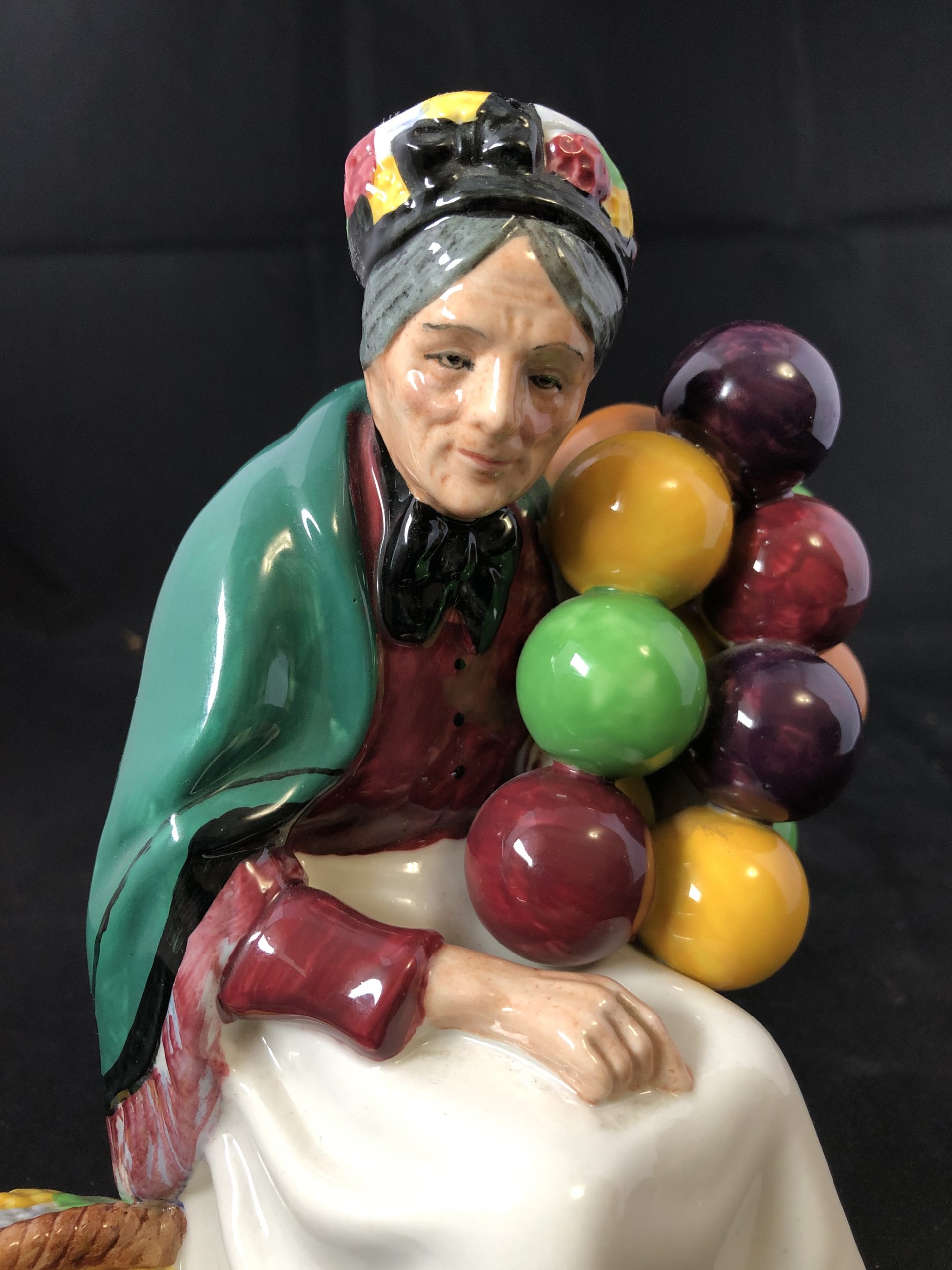 Read more about the article Royal Doulton Old Balloon Seller England Figurine – HN1315